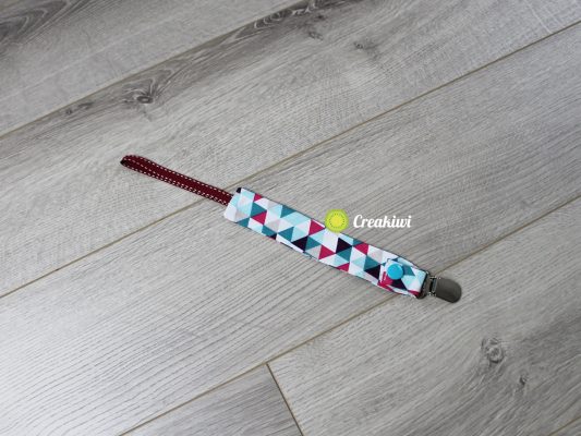 Attache tétine pince métal ruban bordeaux