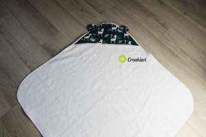 Cape de bain blanche motif biches