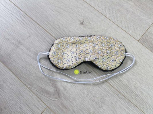 Masque de nuit doré et noir