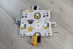 Doudou plat étiquettes animaux zoo jaune noir gris