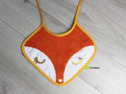 Bavoir Melchior le renard qui dort